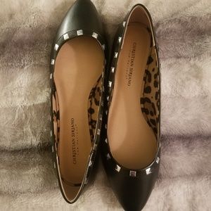 Black pointed toe flats with studs